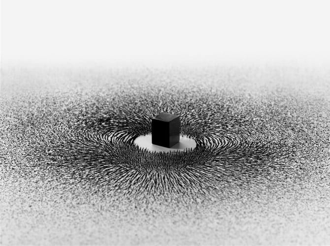 Magnetism: A conceptual installation using magnets and iron filings to depict the spiritual gravitation of pilgrims toward the Kaaba.